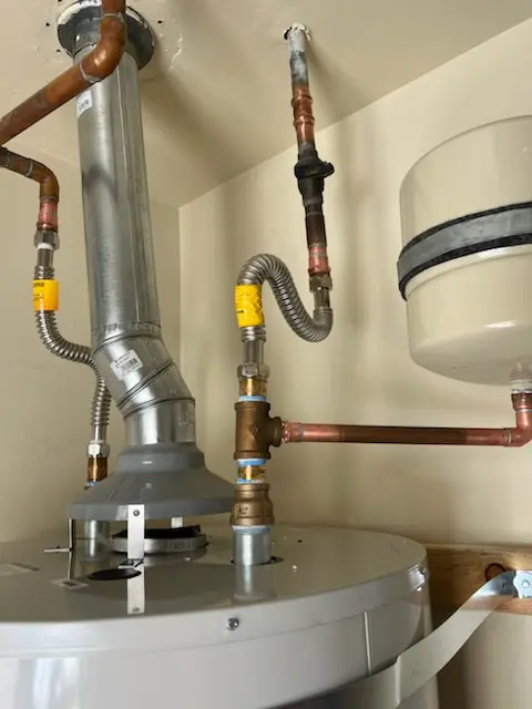 Water heater installation and plumbing repair in Marcella